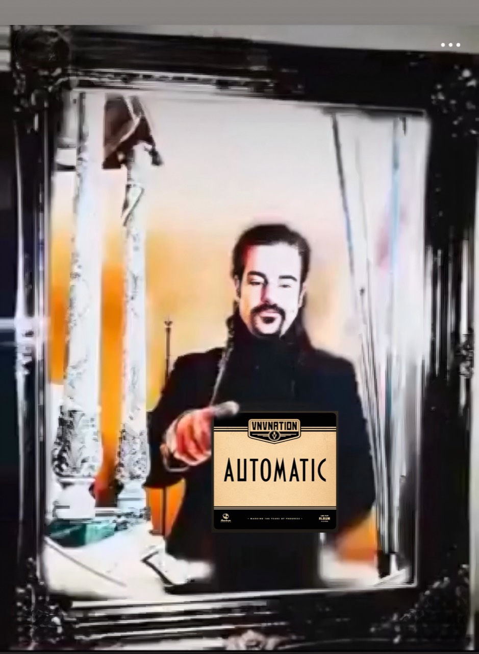 Simon Falk with VNV Nation’s Automatic album artwork